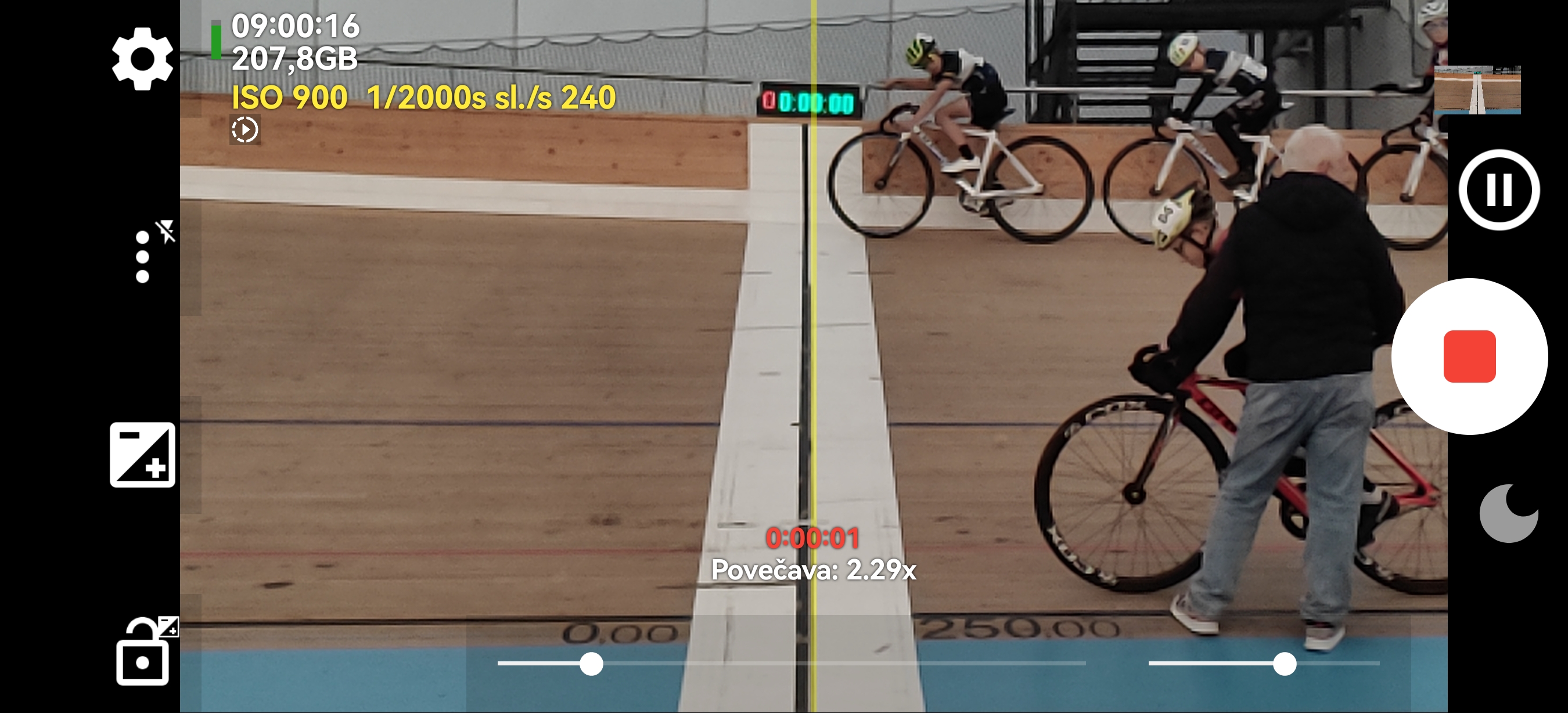 Two riders crossing the finish line in slow motion
